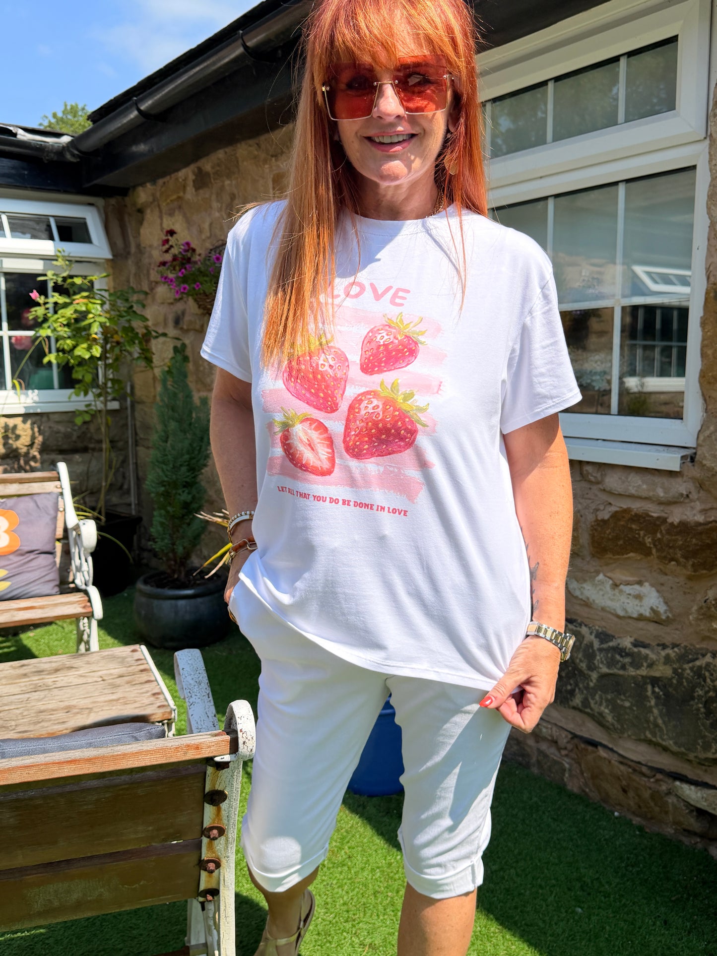 Sophie: White & red strawberry T shirt. One size: 10-16