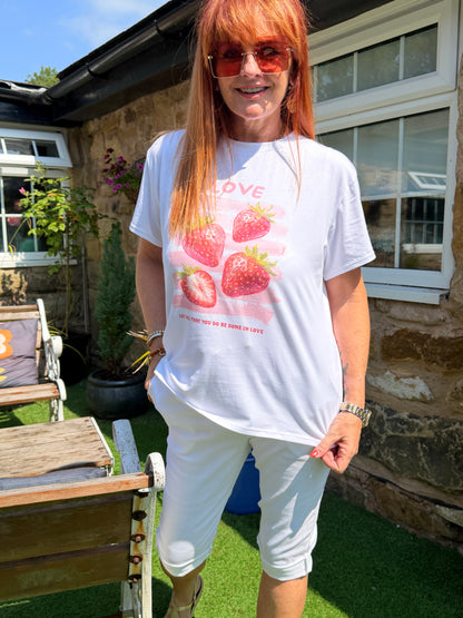 Sophie: White & red strawberry T shirt. One size: 10-16