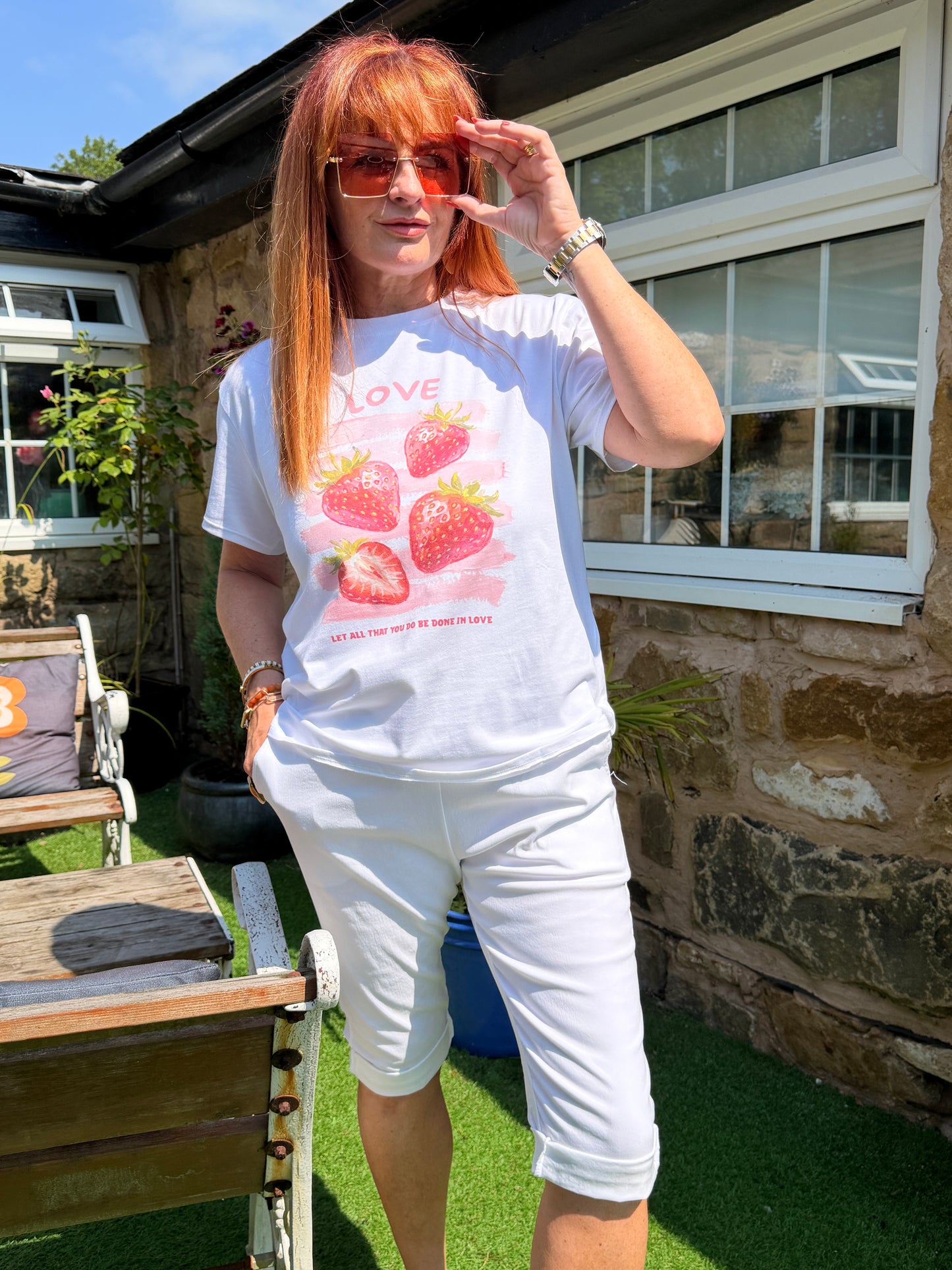 Sophie: White & red strawberry T shirt. One size: 10-16