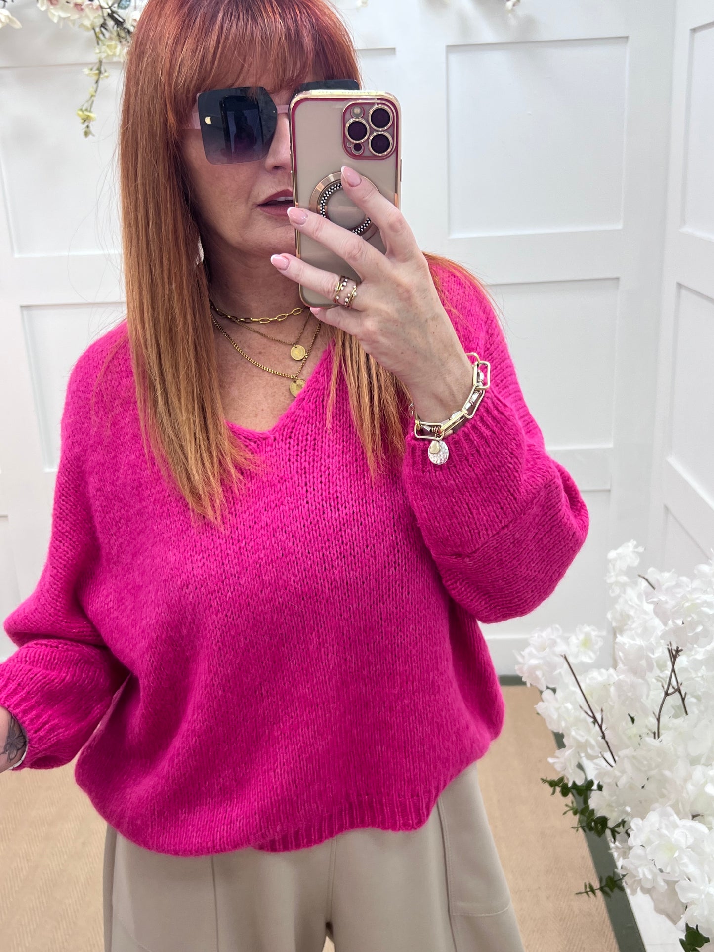 Alex: Hot pink V neck knitted top. One size 14-20
