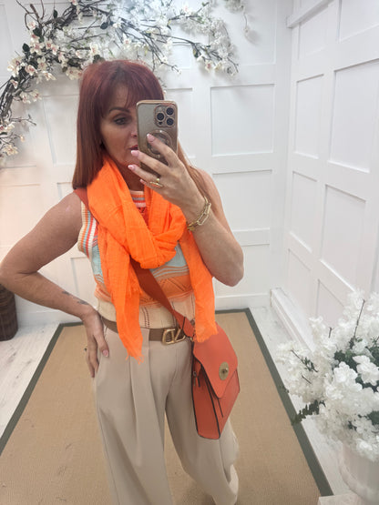 Tula: Neon orange long frayed raw edge scarf. One size