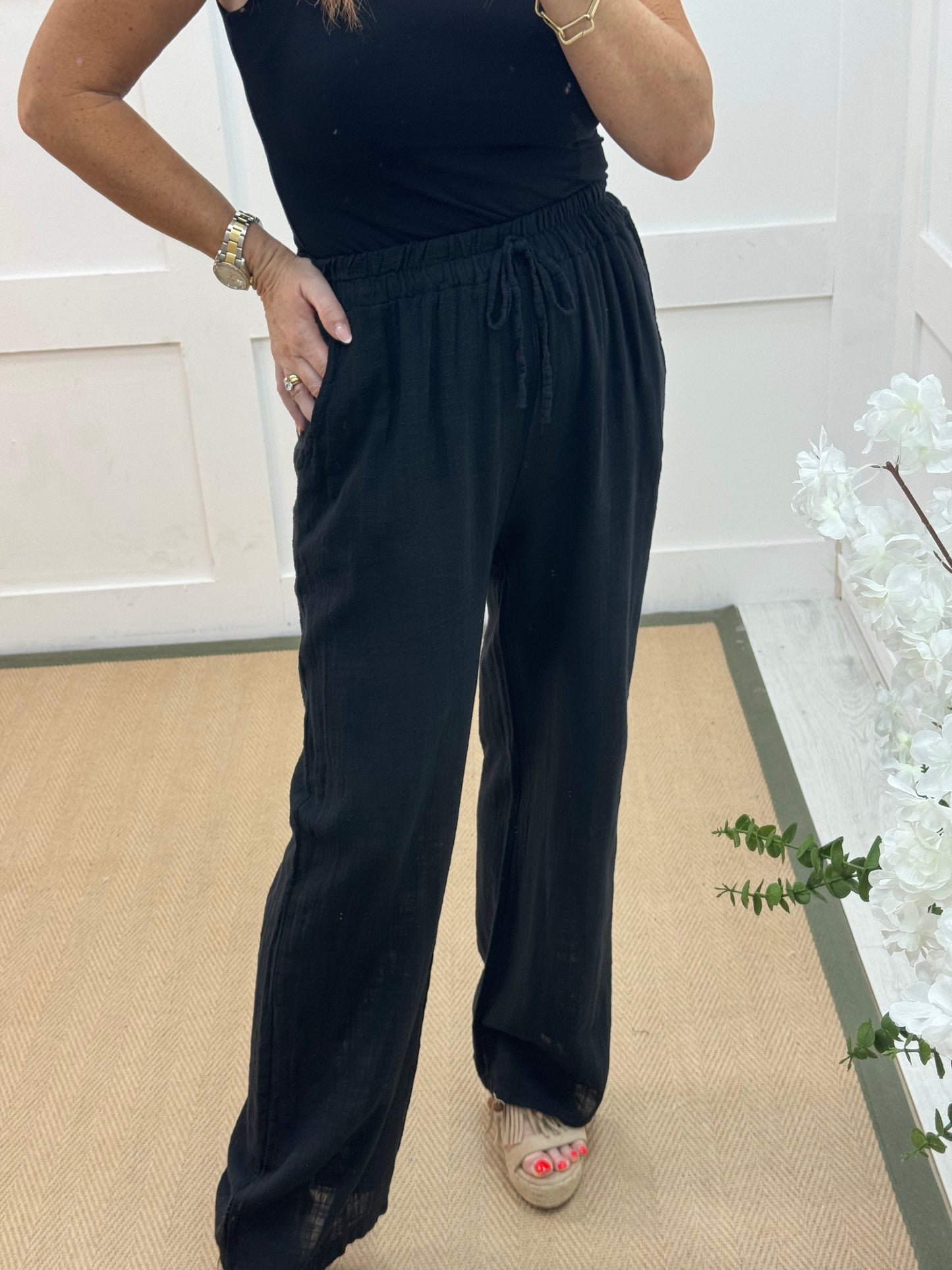 Tori: Black cotton wide leg trousers. One size: 8-16