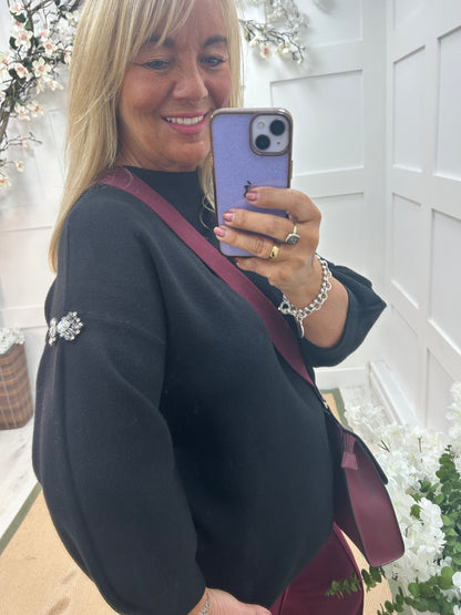 Nikita: Black cashmere rhinestone top. One Sz: 12-18