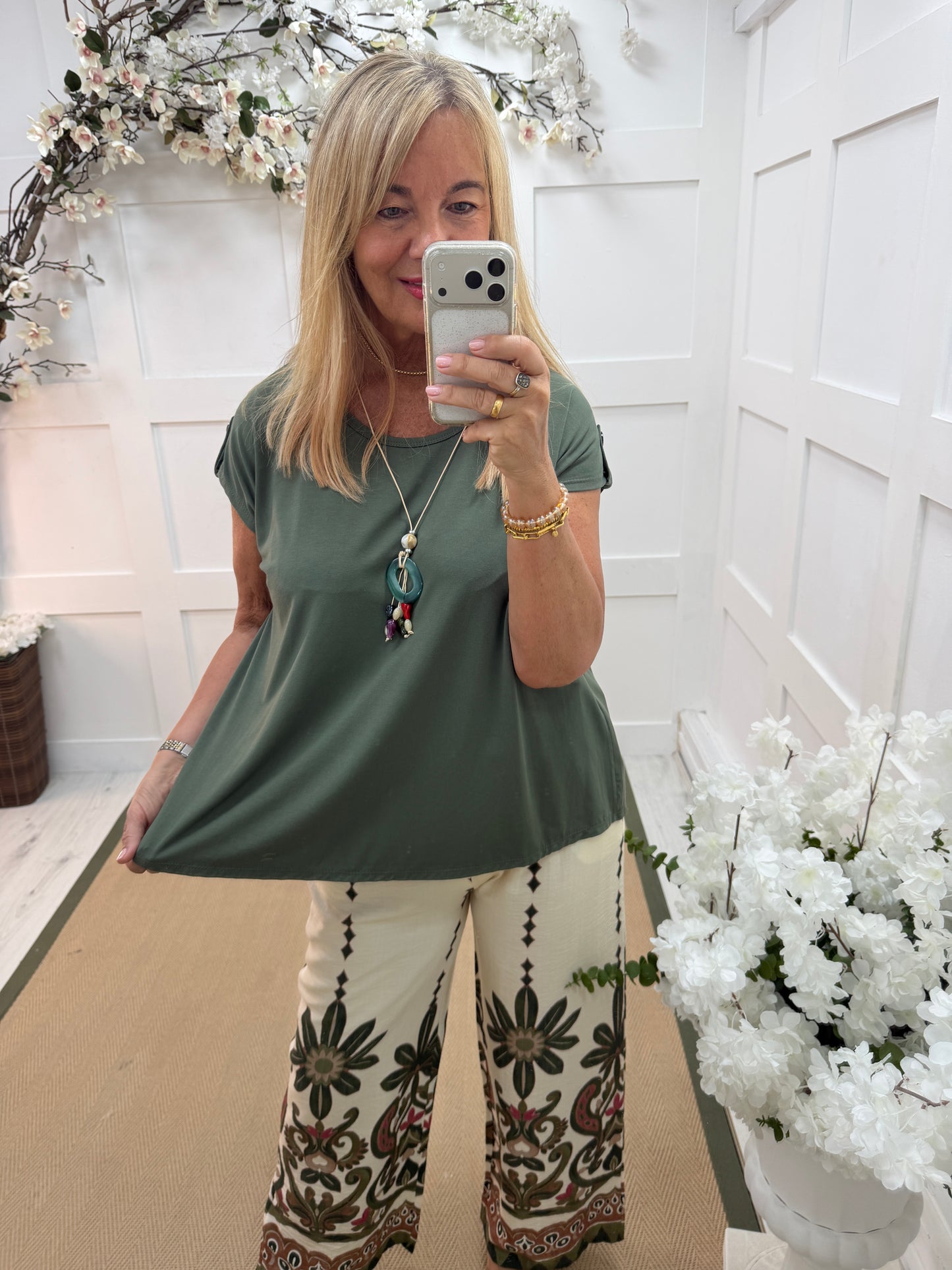 Nelly: Khaki short sleeved top with beaded necklace. One size 12-16