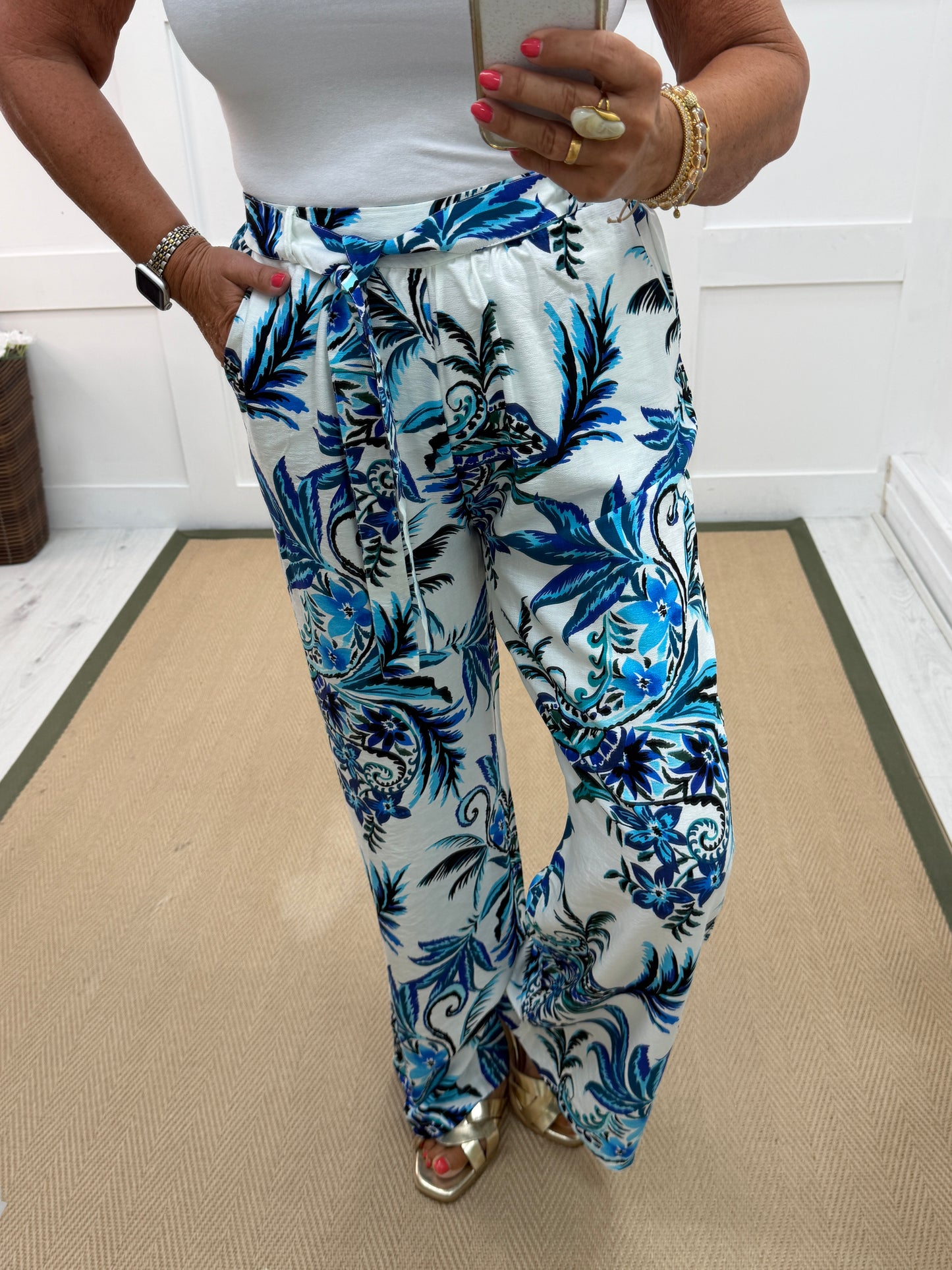 Lois: Blue & white floral wide leg trousers. Sizes: 10-14
