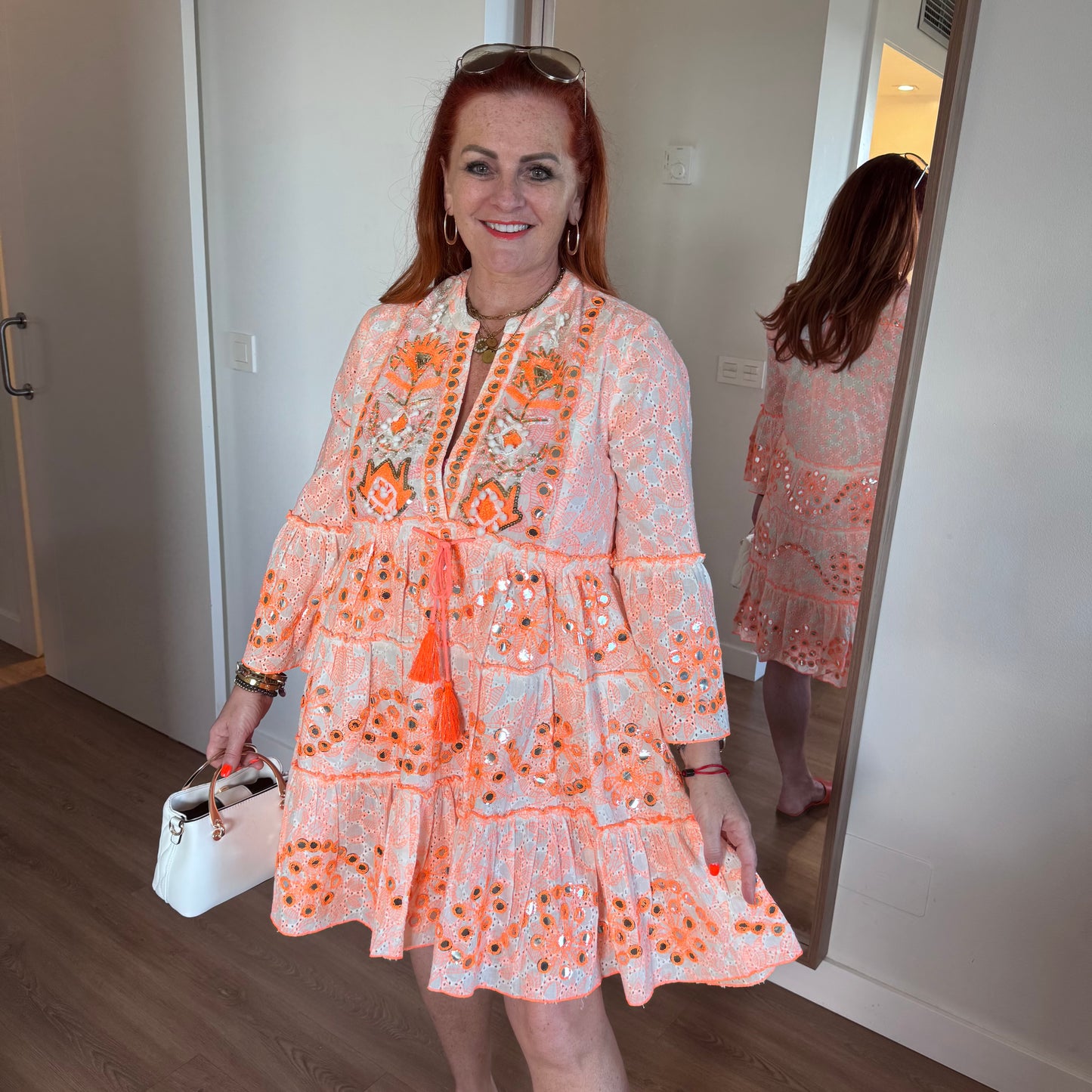 Skylar: Neon orange short embroidered sequin dress. One size: 12-18