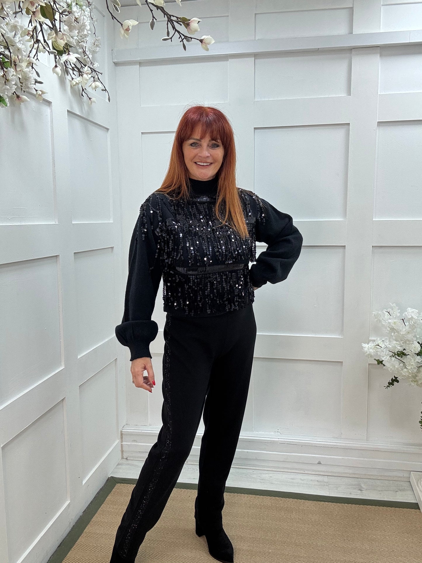 Pixi: Black tassel sequin knit. Two sizes.