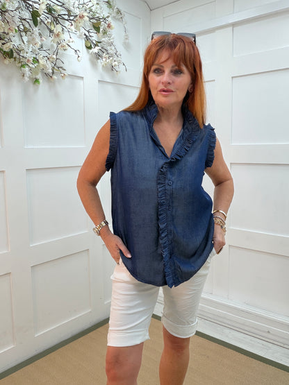 Darla: Dark blue sleeveless ruffle shirt top. 2 sizes