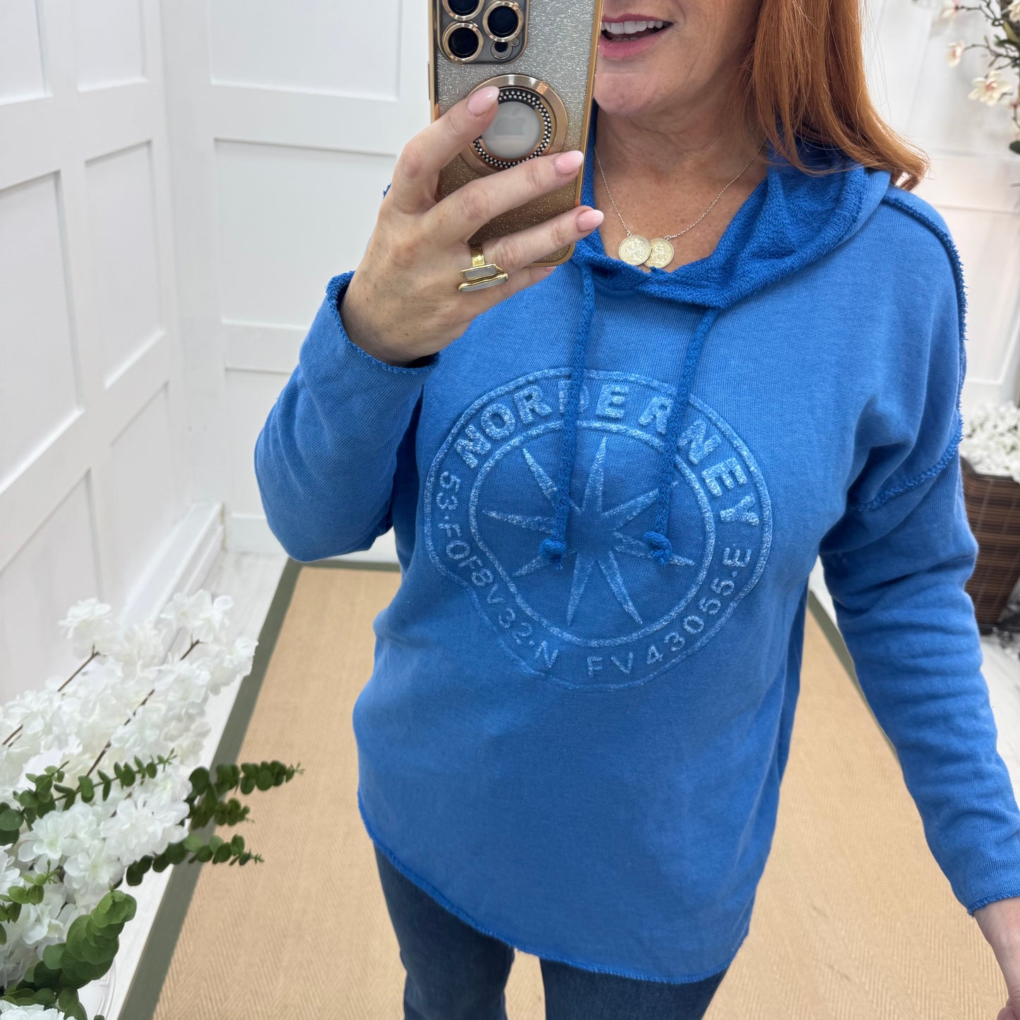 Sara: Cobalt hooded embossed compass top. One size: 12-18