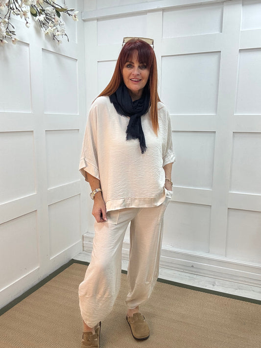 Bobbie: Cream two piece silky trim trouser set. One size: 10-16