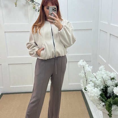Trudy: Taupe stretchy wide leg pocket trousers. 2 sizes