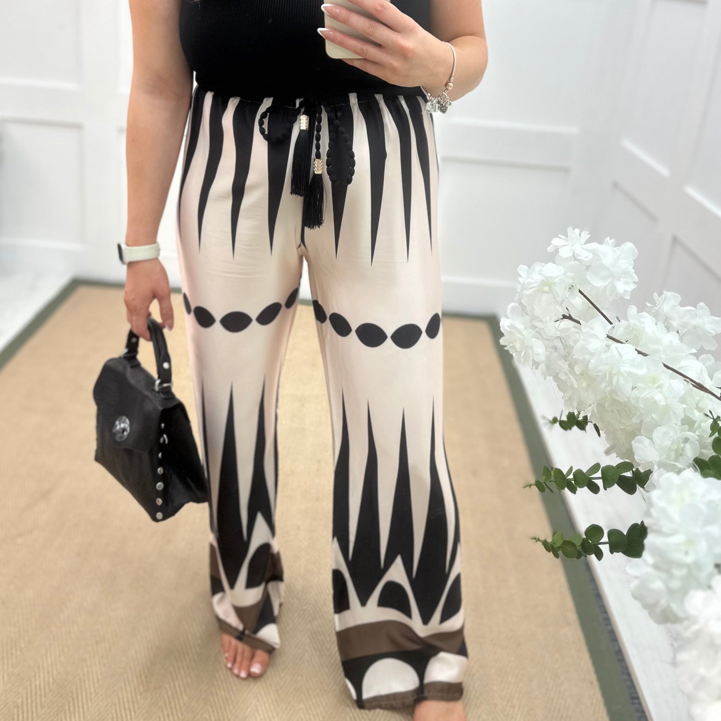 Diana: Cream & black printed wide leg trousers. One size: 10-16