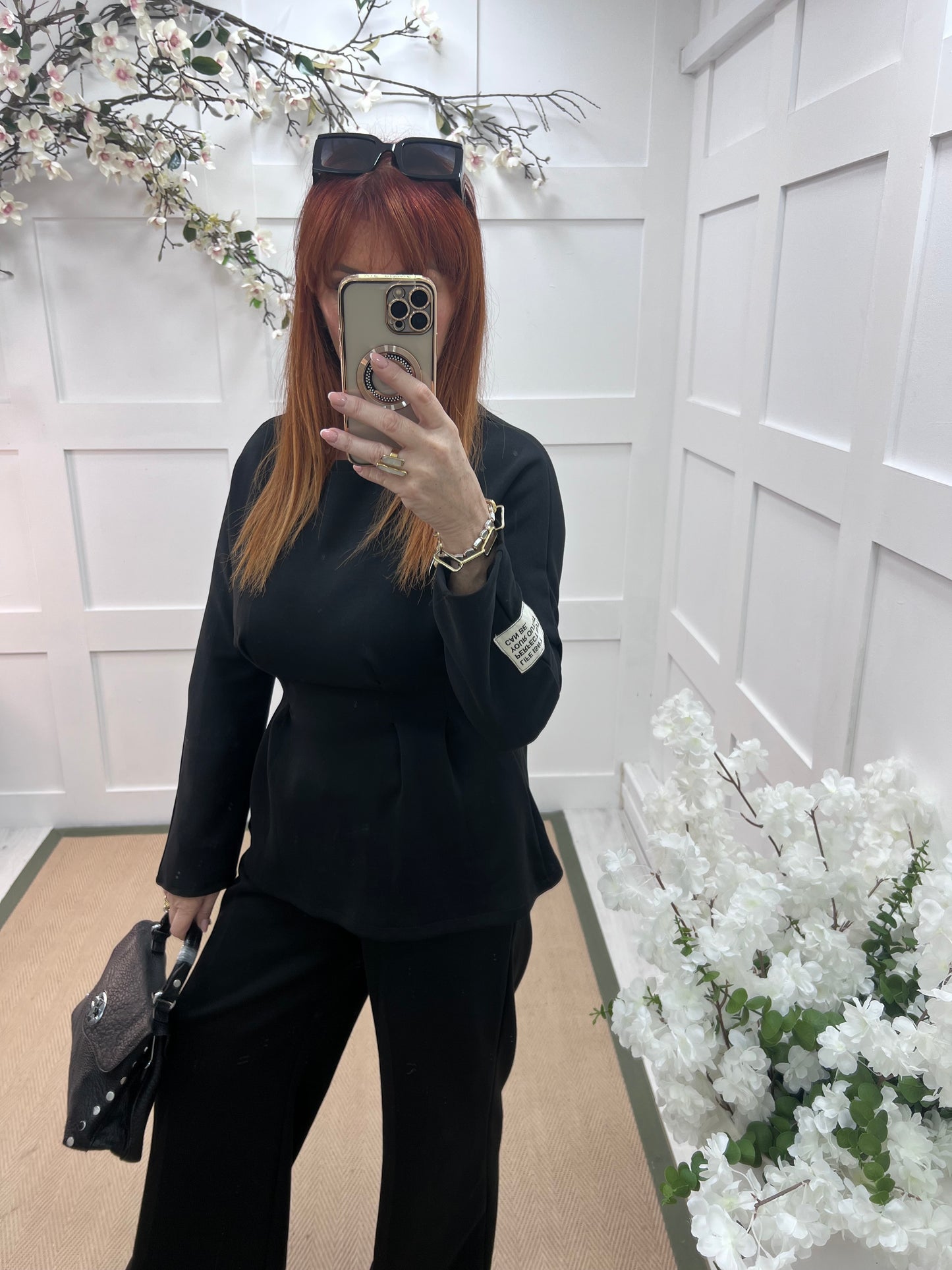 Pandora: Black 2 piece peplum loungewear set. One size: 10-14