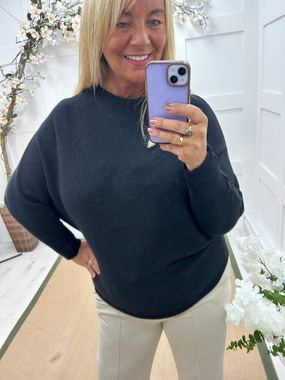 Sammi: Black batwing knitted top. One size: 12-18