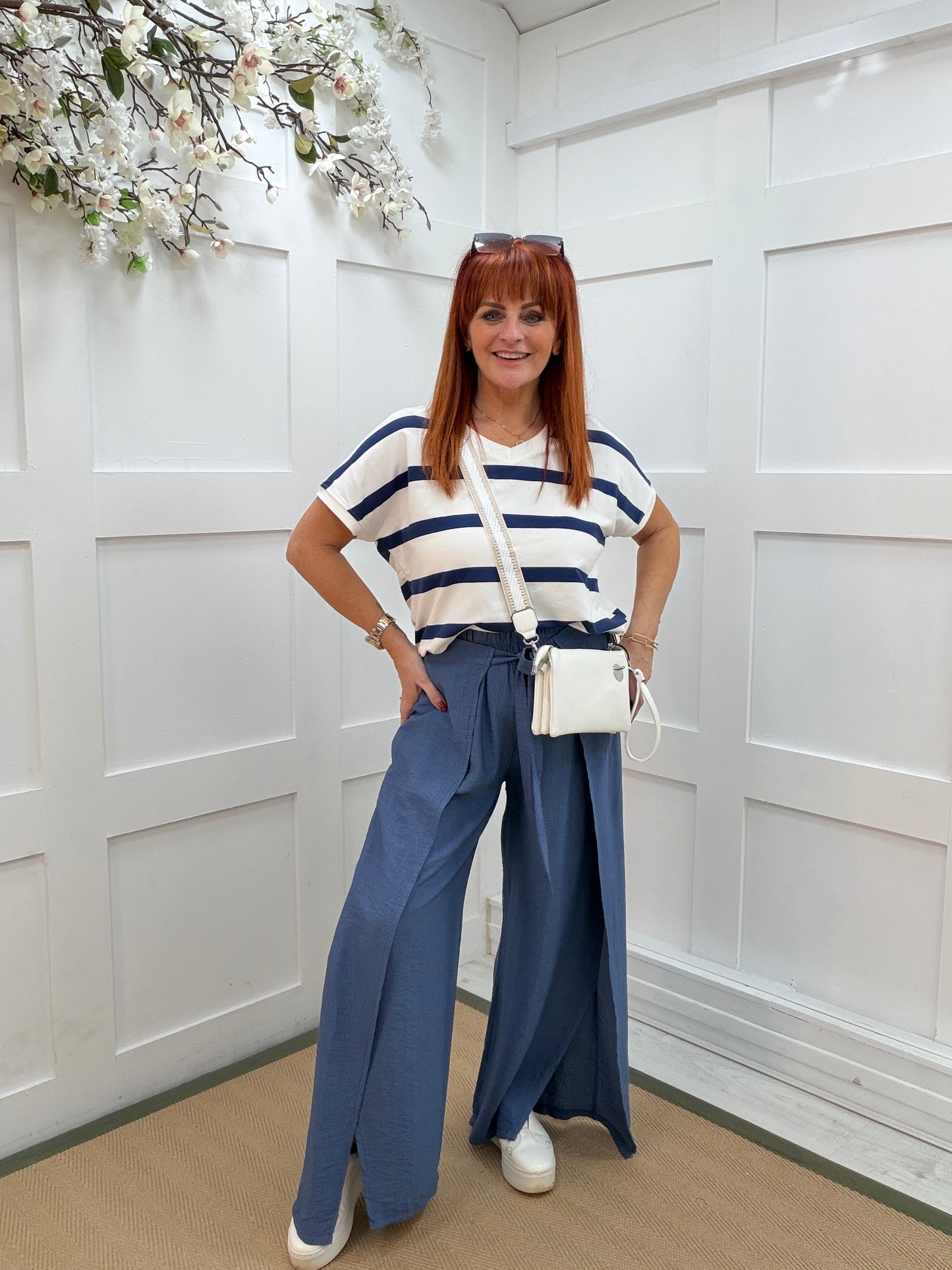 Eden: Denim blue tie waist wide leg trousers. One size: 10-16