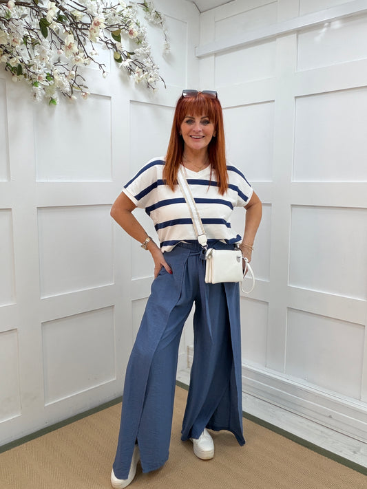 Eden: Denim blue tie waist wide leg trousers. One size: 10-16
