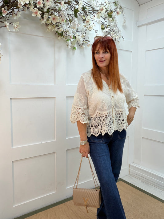 Effie: Cream embroidered V neck button top. One size: 12-18