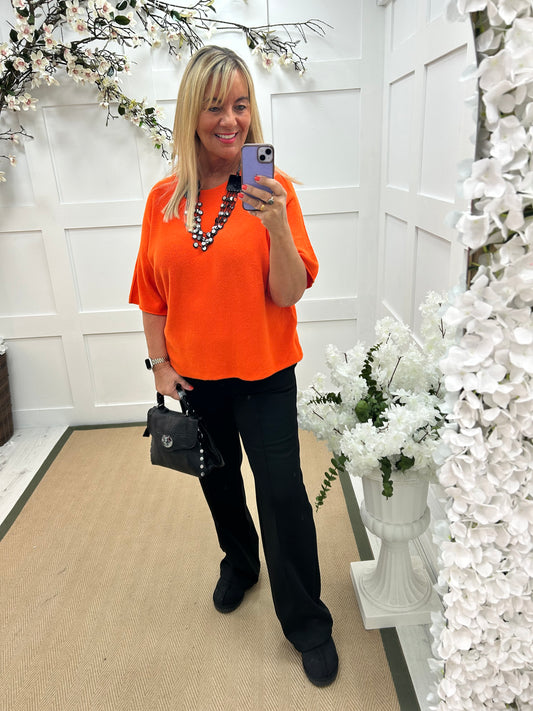 Carys: Orange short knitted top. One size: 12-18/20
