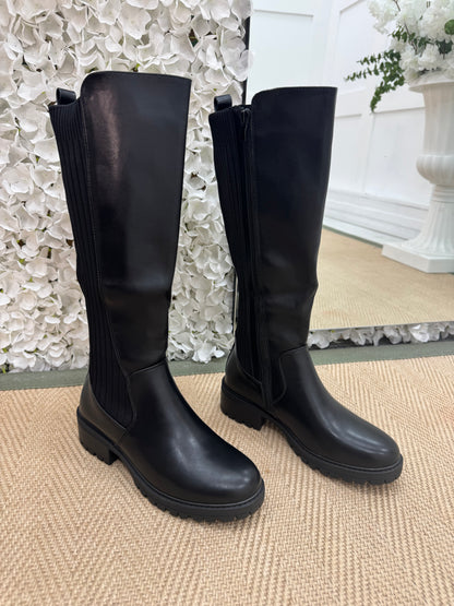 Trova Black stretchy knee high boots. Sizes: 3-8