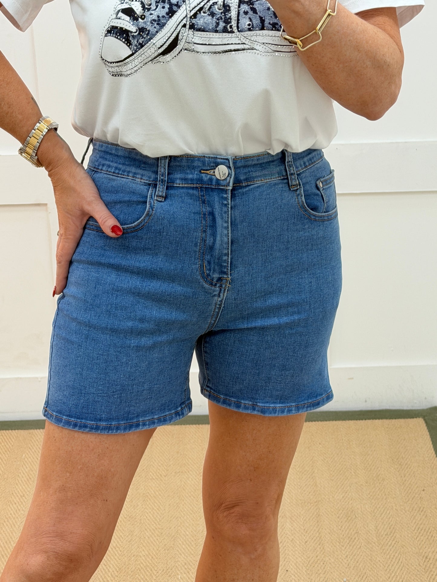 Daisy: Denim blue stretchy shorts. Sizes: 8-16