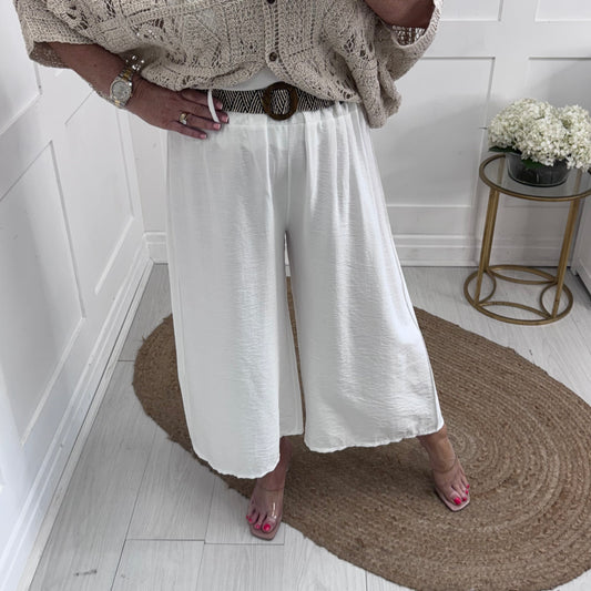 Jessica: White belted 3/4 palazzo trousers. One size: 8-14