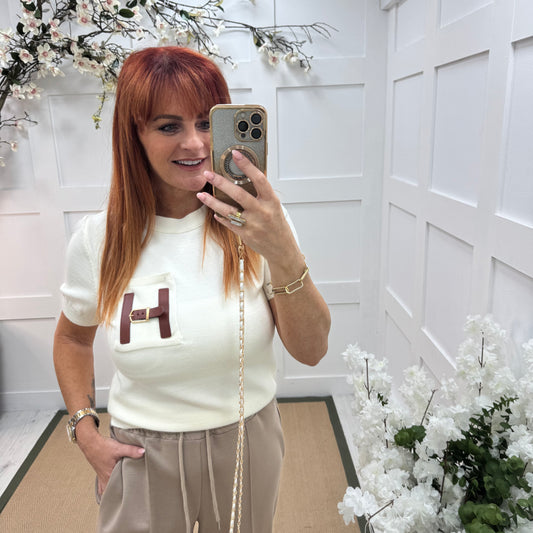 Harley: Ivory H logo knit top. One size: 10-16