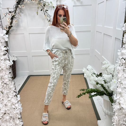 Danni: Stretchy cream leopard printed magic trousers. 2 Sizes