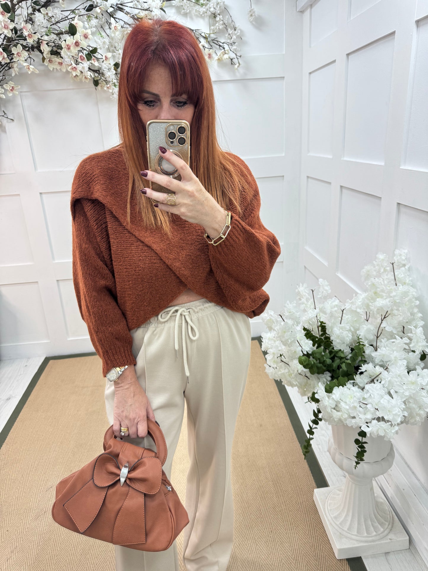 Willow: Burnt orange stretchy short wrap top. One size: 10-18