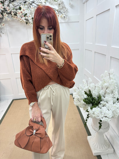 Willow: Burnt orange stretchy short wrap top. One size: 10-18