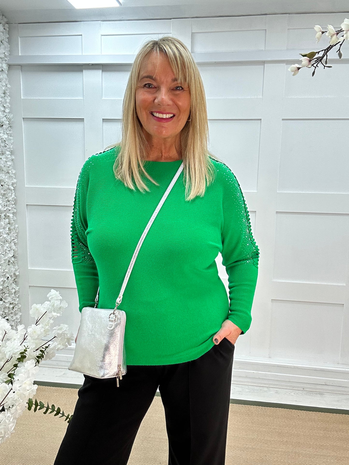 Arianne: Green sparkle cutout shoulder top. One size: 12-16