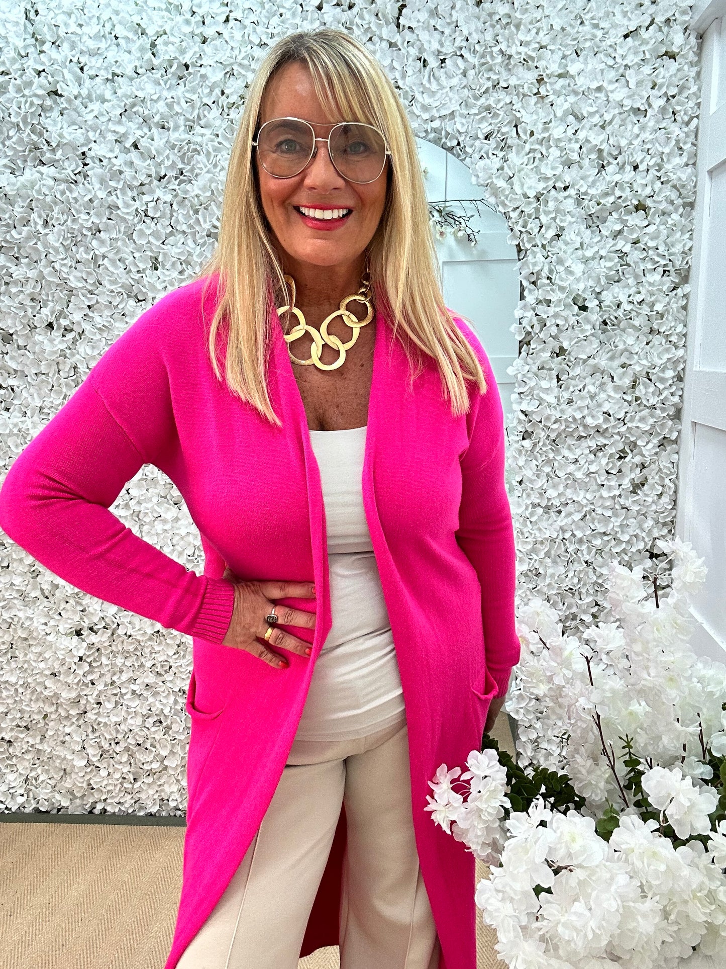 Marley: Pink plain longline pocket cardigan. One size: 12-18