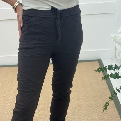 Marnie: Stretchy brown magic trousers with rear pockets. 3 Sizes: 10-22