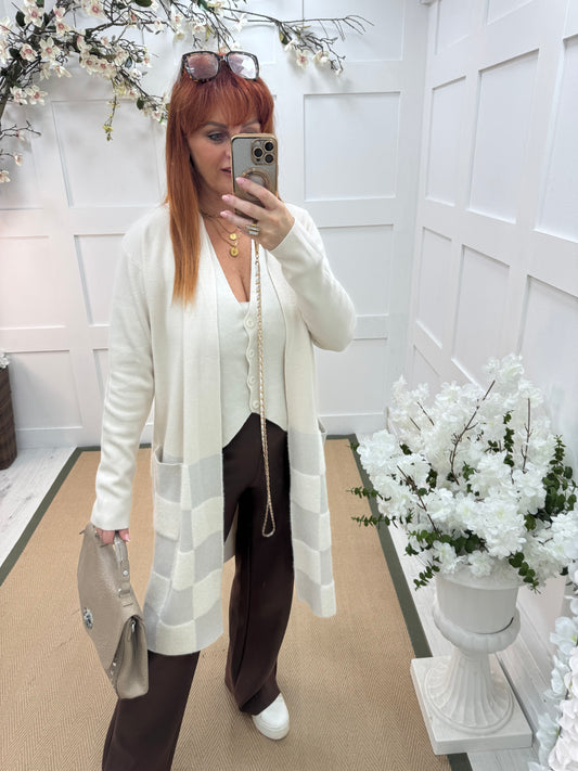 Martha: Cream long pocket cardigan. One size: 12-18
