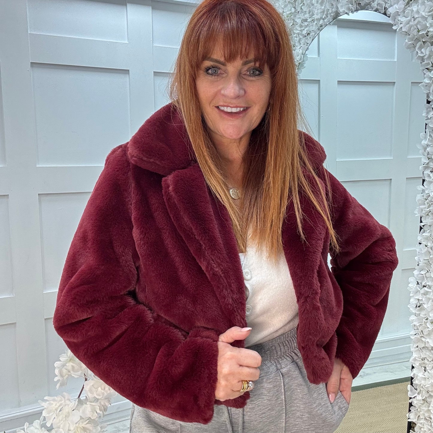 Paula: Burgundy short faux fur jacket . One size 10-16