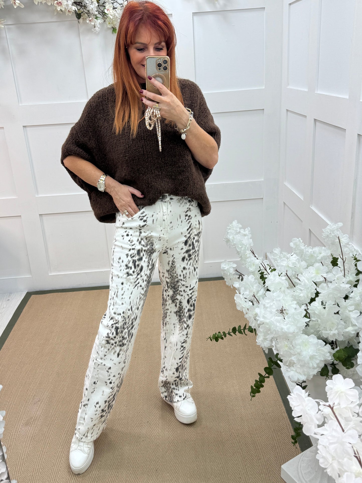 Libby: White & brown patterned jeans. Sizes: 10-20