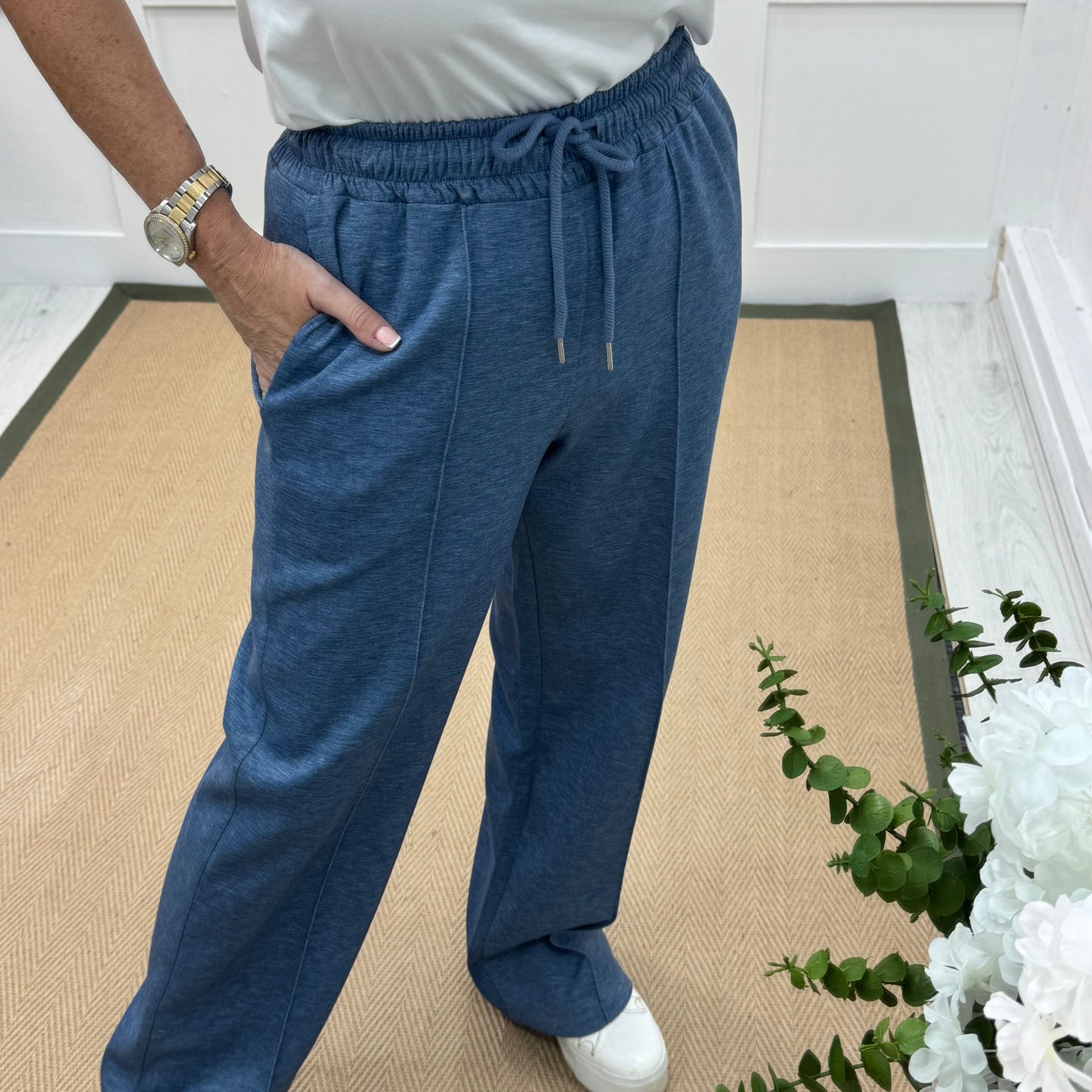Trudy: Denim blue stretchy wide leg pocket trousers. 2 sizes