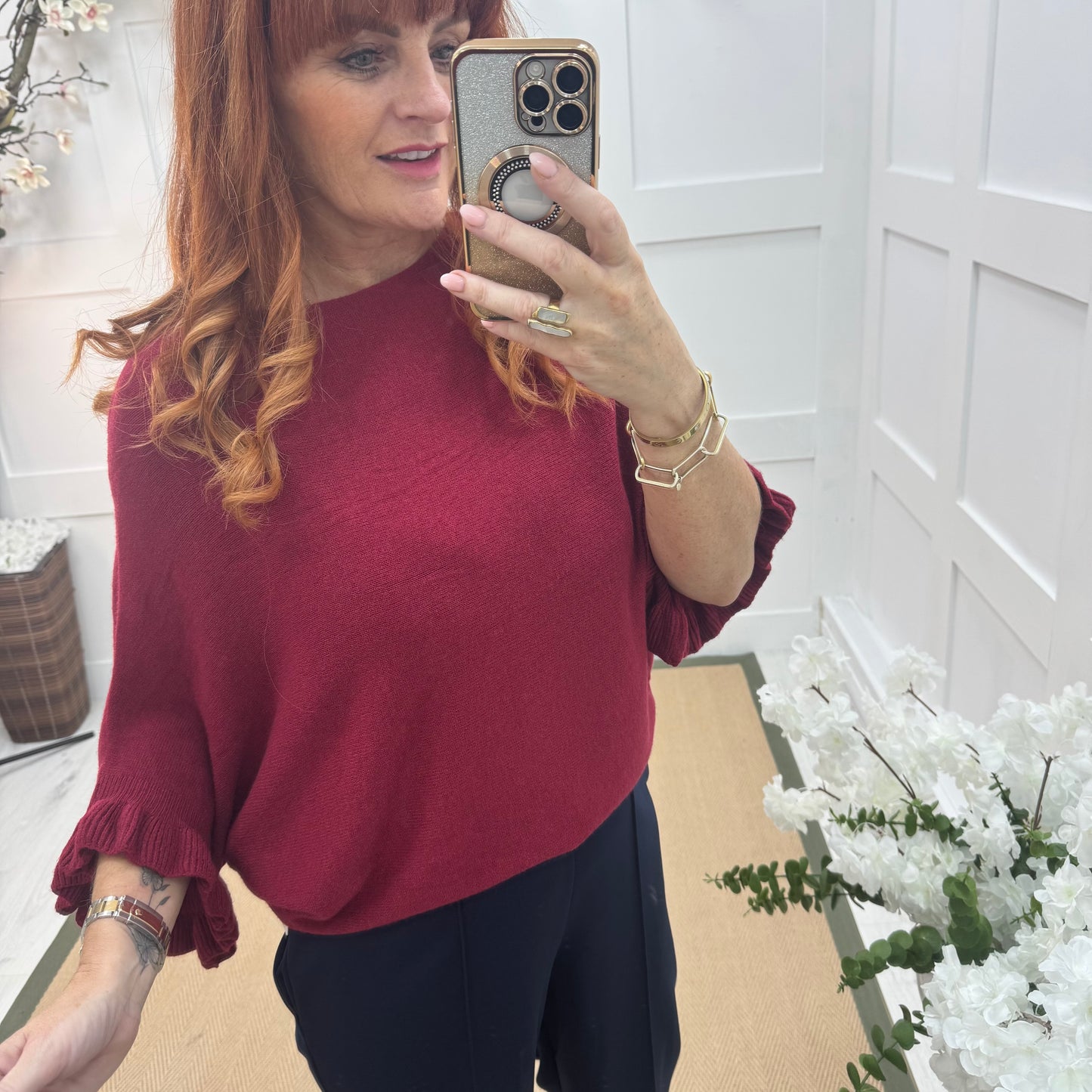 Sierra: Burgundy batwing fluted sleeve knitted top. One Size 12-18/20