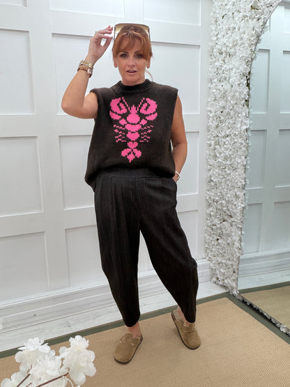 Larrie: Sleeveless lobster soft knit top. One size: 14-18. 2 colours