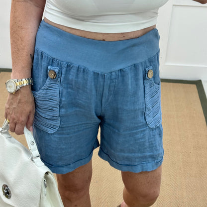 Brogan: Blue Made in Italy linen shorts. Sizes: 12-18