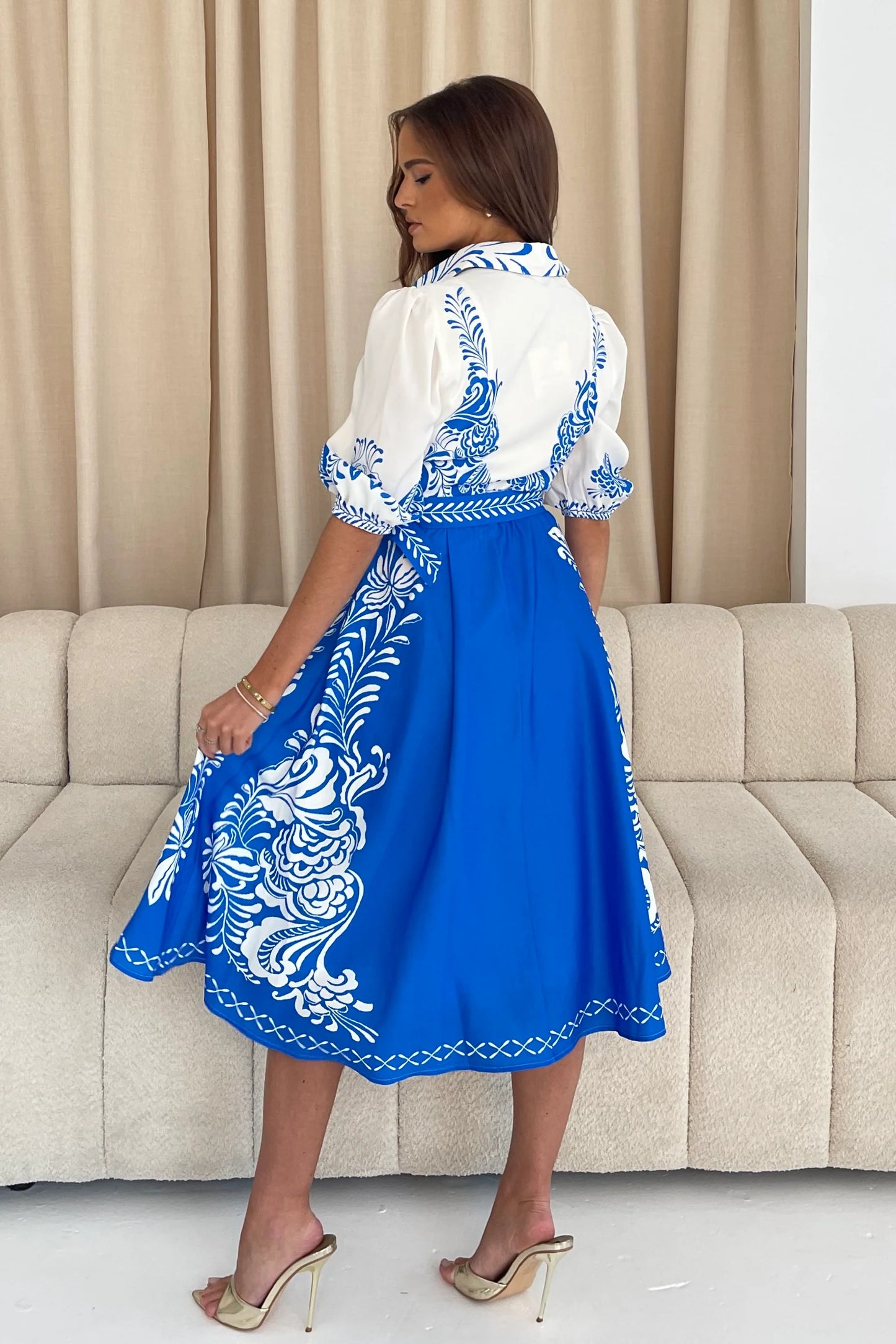 Holland: Blue & white print belted dress. Sizes: 12-18