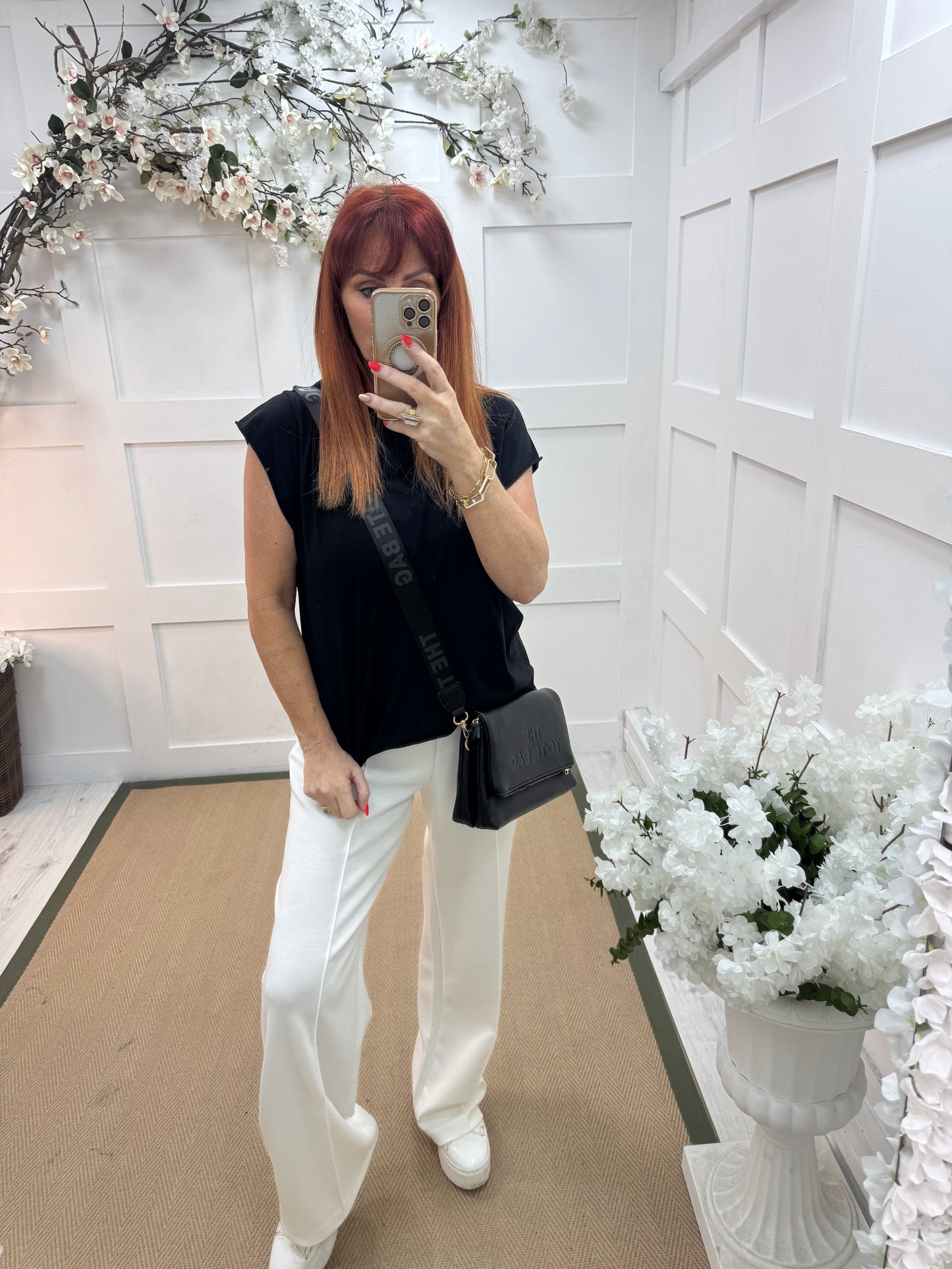 Neve: Basic black cotton T shirt. One size: 10-18