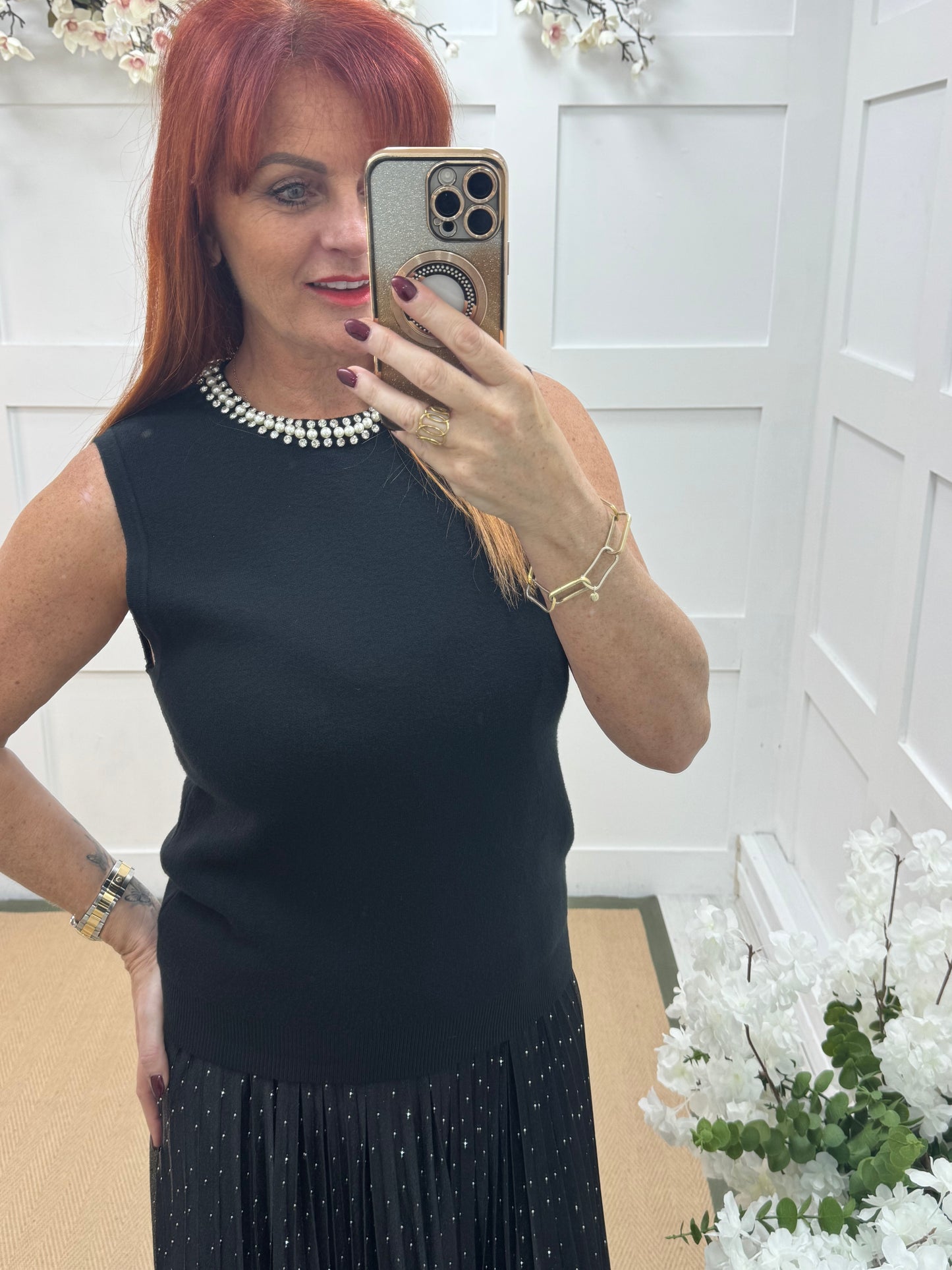 Raven: Black rhinestone sleeveless top. One size: 12-16