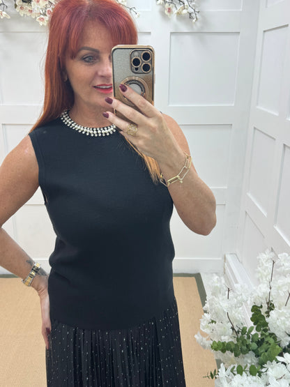 Raven: Black rhinestone sleeveless top. One size: 12-16