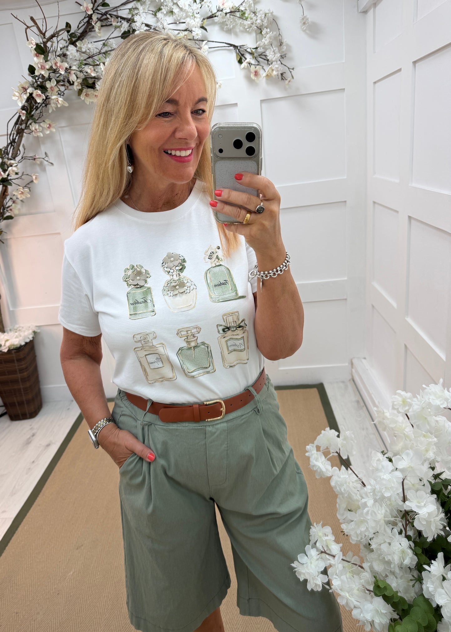 Priya: White & khaki 3D perfume T shirt. One size: 10-16
