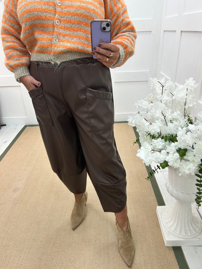 Drew: Brown faux leather cocoon trousers. One size: 12-18