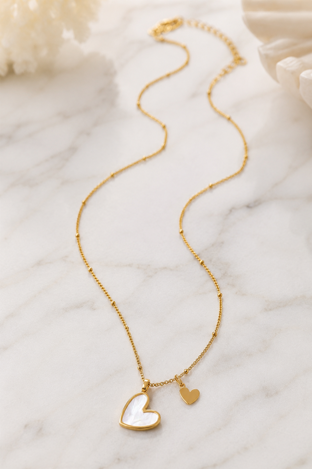 Adora: 18k gold mother of pearl heart necklace