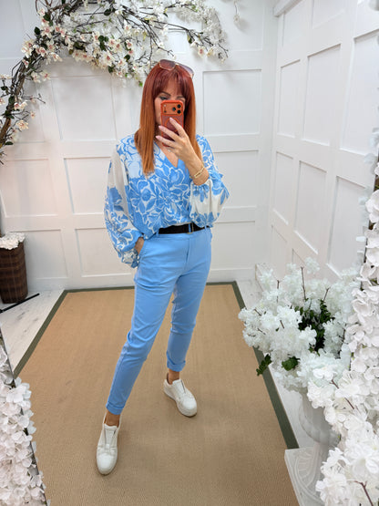 Marley: Blue stretchy frill pocket magic trousers. One Size: 8-14