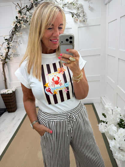 Connie: White & stripe seaside design graphic T shirt. One size: 10-16