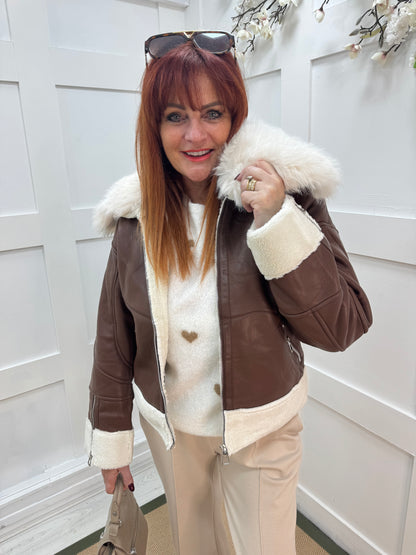 Fiora: Brown faux fur leather jacket. Two sizes
