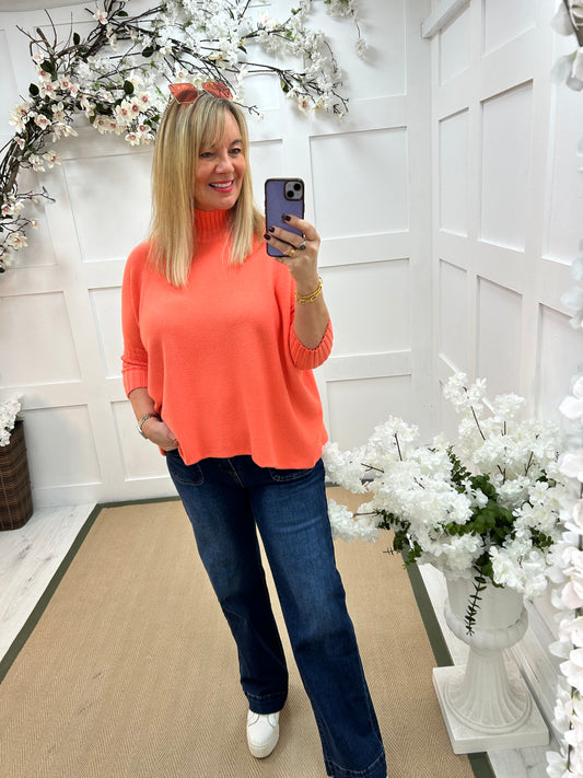 Sammie: Coral high neck knitted top. One Sz: 12-18